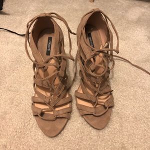 Nude strappy heels